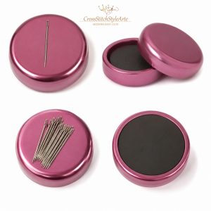 How to Start Cross-Stitching: A Beginner's Guide. 26 Magnetic needle minder holding embroidery needles for cross stitch on a white background